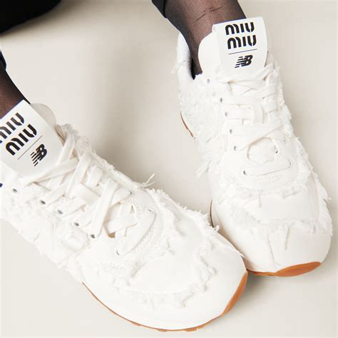 574 miu miu